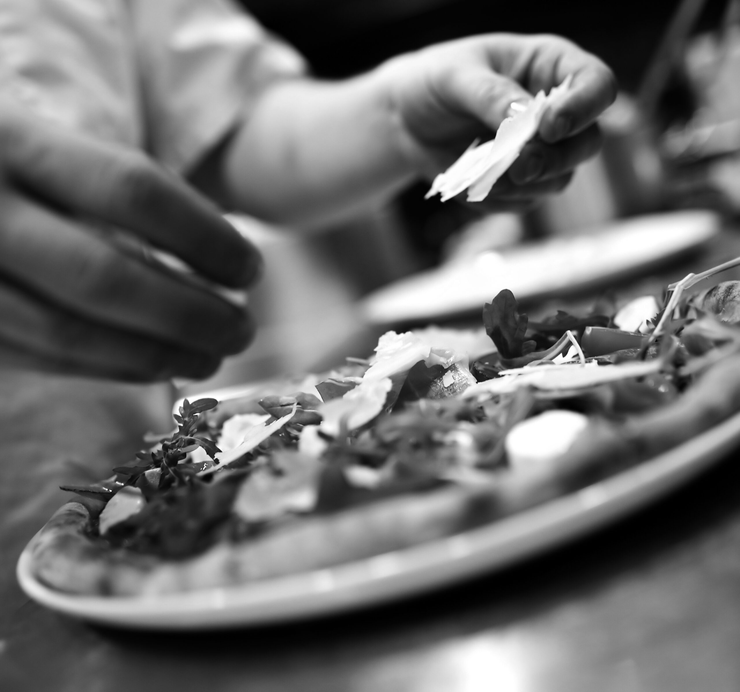 Closeup,Hand,Of,Chef,Baker,In,White,Uniform,Making,Pizza